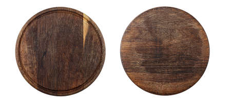 two round wooden pizza board isolated on white backgroundの写真素材