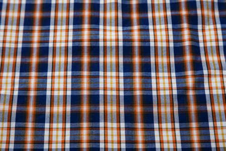 textile background in a cage. traditional design of men's shirts. place for textの写真素材