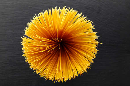 Raw spaghetti bunch top view.