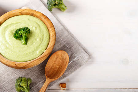 cream soup with broccoli with rusks and dumplings top view. appetizing vegetable vegan productの写真素材