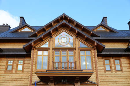 facade of a modern wooden house close-up. building of townhouses