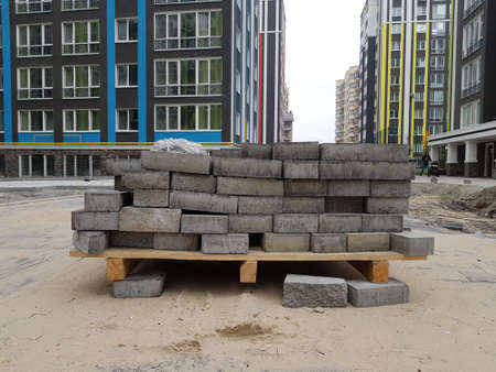 Concrete bricks stacked at a construction site. construction of a new residential area