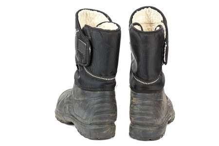 old rubber men's boots, inside insulated with fur. isolated on white background.の写真素材