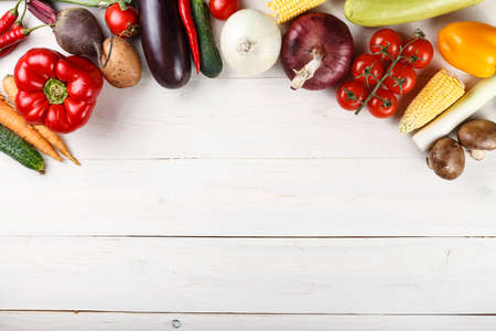 vegetarian vegetables menu on wooden background. space for textの写真素材