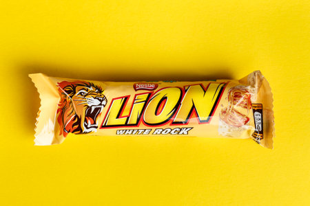 Ukraine, Kiev March 29, 2018. Lion bar isolated on white. Lion is a chocolate bar confection that is...