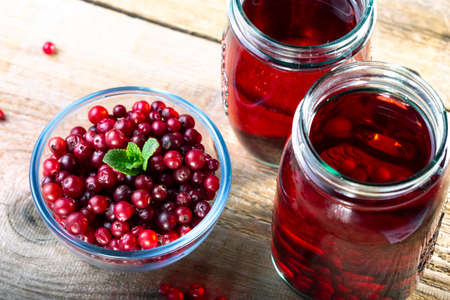 Ripe cranberries in a glass plate. Berry Compoteの写真素材