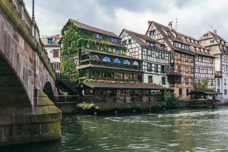 Strasbourg, France - July 26, 2017. Old medieval houses over the canal with a bridge in Strasbourg
