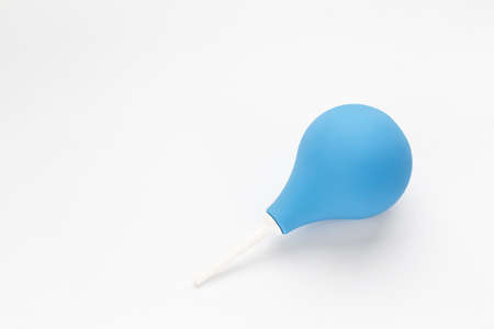rubber blue cleansing enema on a white background. space for textの写真素材