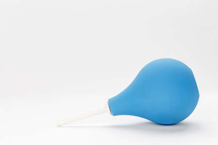 rubber blue cleansing enema on a white background. space for textの写真素材