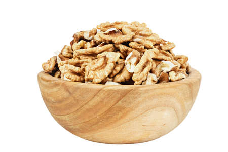 walnuts peeled in a plate isolated on white background. clipping pathの写真素材