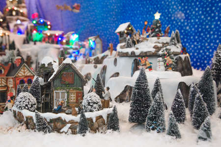 snow city toy with miniature houses and people. image of New Year's mess
の写真素材