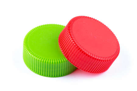 Plastic bottle caps on white background.