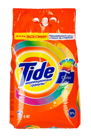 Ukraine, Kiev - February 20. 2020: Tide Washing Powder. Tide brand is a manufacturer of laundry detergent products. Field with Clipping Path.のeditorial素材