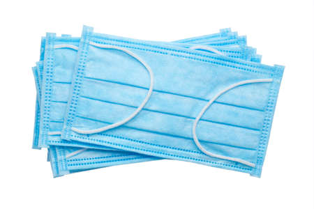 Blue medical face masks isolated on white isolated on white background, Corona protection.