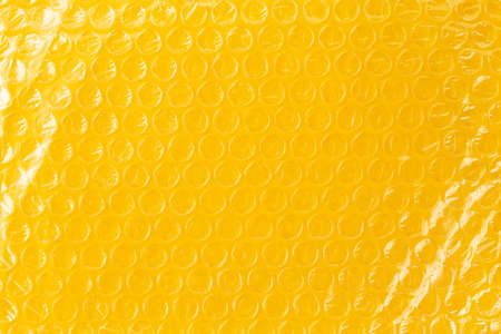 background oilcloth, packing von oilcloth yellow color. Top view.の写真素材