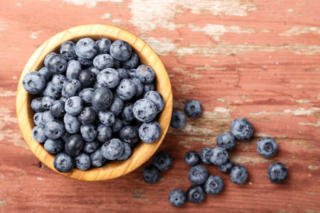 Blueberry antioxidant organic superfood in a wood bowlの写真素材