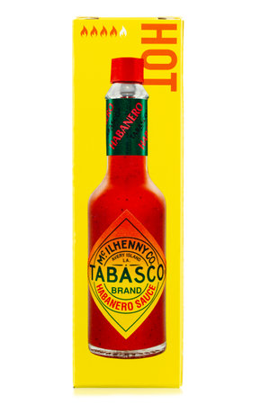 Ukraine, Kyiv - December 01.2020: Tabasco sauce in carton box. Tabasco sauce was started in 1868 and is made from tabasco peppers.のeditorial素材