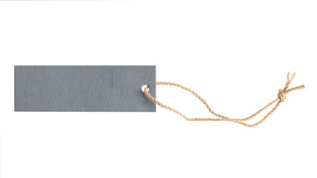 Blank tag anchored to hang on a product to show prices and discounts isolated on white background....