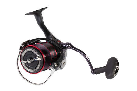 Spinning fishing reel isolated on a white background.の写真素材