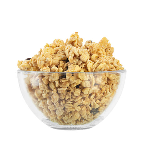 Glass bowl of muesli and granola isolated on white background. Healthy breakfast. Oatmeal. File contains clipping path.の写真素材