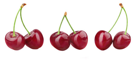Ripe fresh red cherry isolated on white background. File contains clipping path. Full depth of field.の写真素材