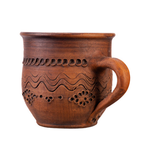 One empty clay cup for milk or tea, isolated on white background. Full depth of field. File contains clipping path.の写真素材