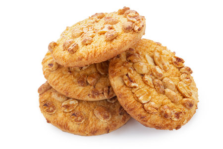 Round shortbread cookies with peanuts. Isolated on white background. File contains clipping pathの写真素材