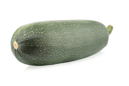 Fresh whole zucchini isolated on white background close up. File contains clipping path. Full depth of field.の写真素材