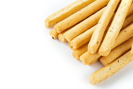 Fresh delicious grissini sticks on white backgroundの写真素材