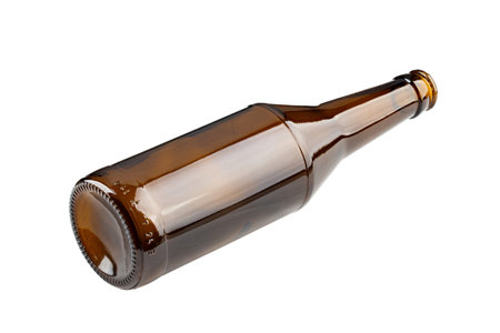 Empty beer bottle made of brown glass, isolated on white background. File contains clipping path. Full depth of field.の写真素材
