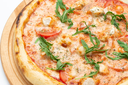 Fresh Italian pizza with arugula and cheese, close-up. Isolated on white background. File contains clipping pathの写真素材