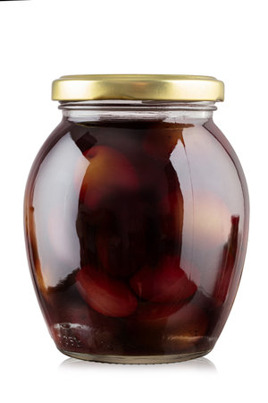 Glass jar of preserved olives on white background. File contains clipping path. Full depth of field.の写真素材