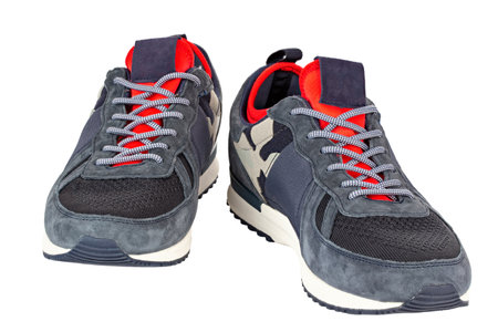 Insulated sneakers with khaki details isolated on white background. Fashionable stylish sports casual shoes. Mock up for design advertising for shoe store. File contains clipping path.の写真素材
