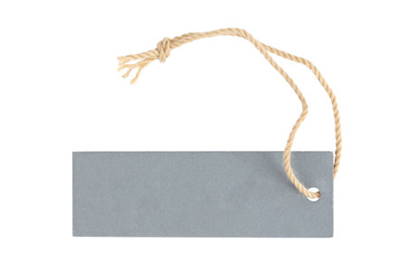Blank tag anchored to hang on a product to show prices and discounts isolated on white background. File contains clipping path.の写真素材