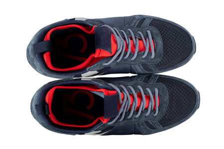 Insulated sneakers with khaki details isolated on white background. Top view. Fashionable stylish sports casual shoes. Mock up for design advertising for shoe store. File contains clipping path.の写真素材