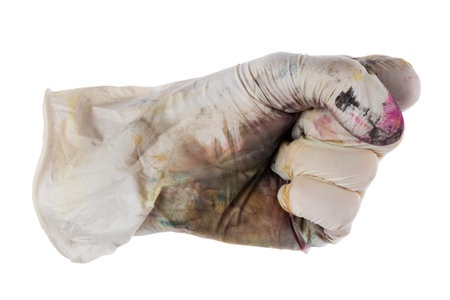 Gloves soiled in paint. Work gloves. Hand in dirty glove in the shape of fist isolate on white background. File contains clipping path.の写真素材