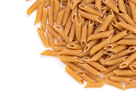 Background from pasta. Penne, Penne Rigate. Space for text. Top view.の写真素材