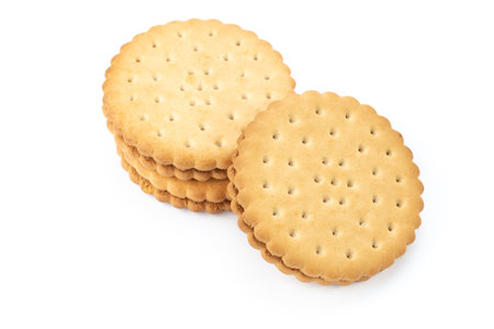 Two round sandwich biscuits isolated on a white background.の写真素材