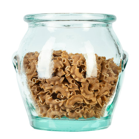 Glass jar filled with raw pasta isolated on white background. File contains clipping path.の写真素材