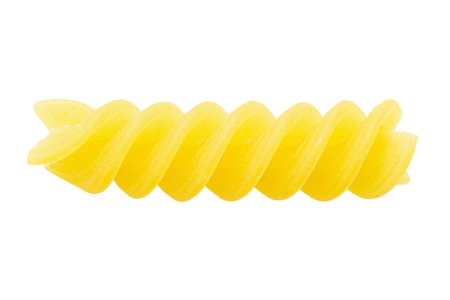 Pasta fusilli extreme close up isolated on white background. File contains clipping path. Top view.の写真素材
