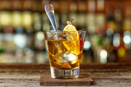 Cocktail is old-fashioned on the basis of bourbon and bitter. One of the very first American drinkの写真素材