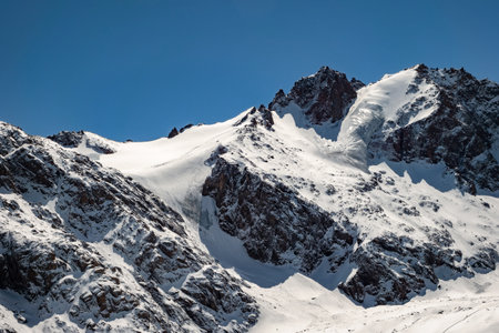 Mountain winter landscape. Mountain peak with glaciers. Alma-Ata's region. Tien Shan mountains. Kazakhstanの写真素材