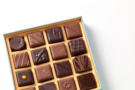 Natural chocolate candies in a beautiful cardboard box.の写真素材