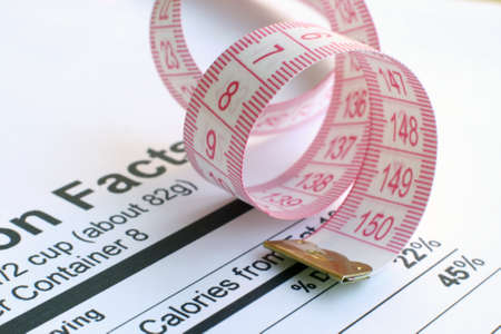 Nutrition facts and measure tape の写真素材