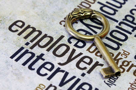 Old key on employer textの写真素材