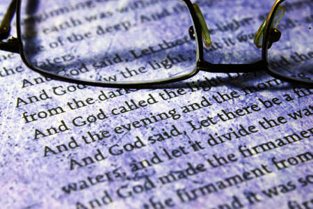 Reading  glasses on bible textの写真素材