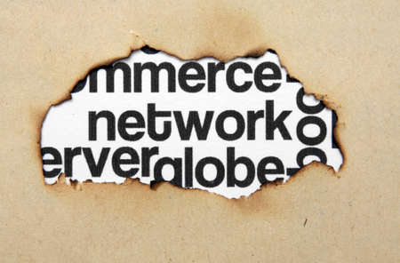 Network word cloud on paper holeの写真素材