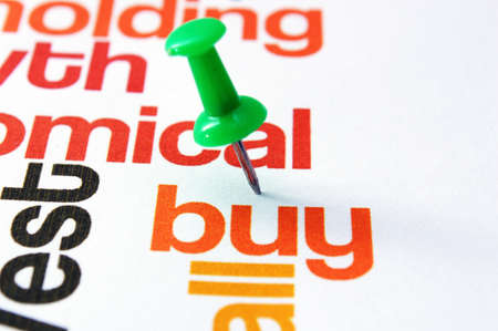 Push pin on buy textの写真素材