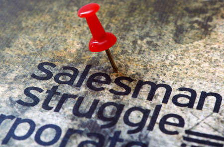 Pushpin on salesman text