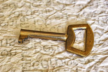 Old golden keyの写真素材